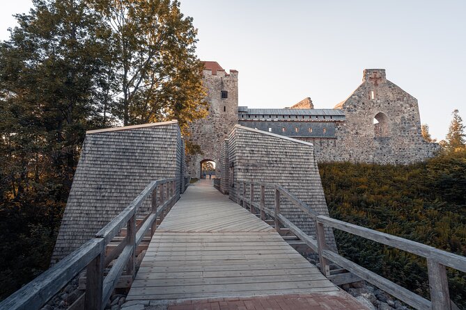 Group Tour: Sigulda and Turaida from Riga. - Gutmanis Cave, inscriptions, and the Rose of Turaida