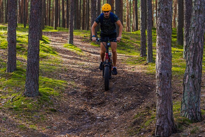 Guided Ebike Tour on Forest Roads and Trails Near Riga - How Pauls shapes the ride