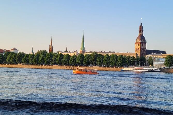 Riga Canal and Daugava Boat Tour with Welcome Drink & Audio Guide - Seeing Riga from the Canal and Daugava