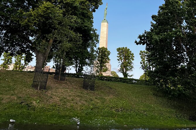 Riga Canal and Daugava Boat Tour with Welcome Drink & Audio Guide - Audio commentary without the fuss
