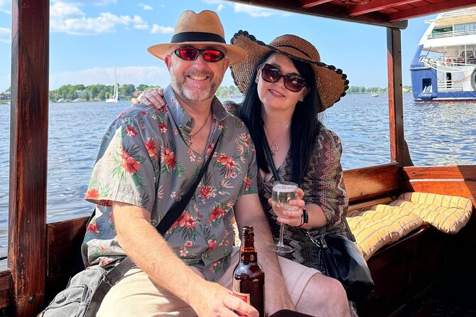 Riga: Evening or Sunset Boat Tour with Drink and Audio Guide - Starting at Andrejosta Marina