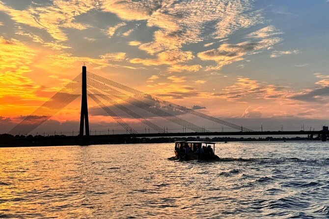 Riga: Evening or Sunset Boat Tour with Drink and Audio Guide - Bridges, the TV tower, and the best photo moments