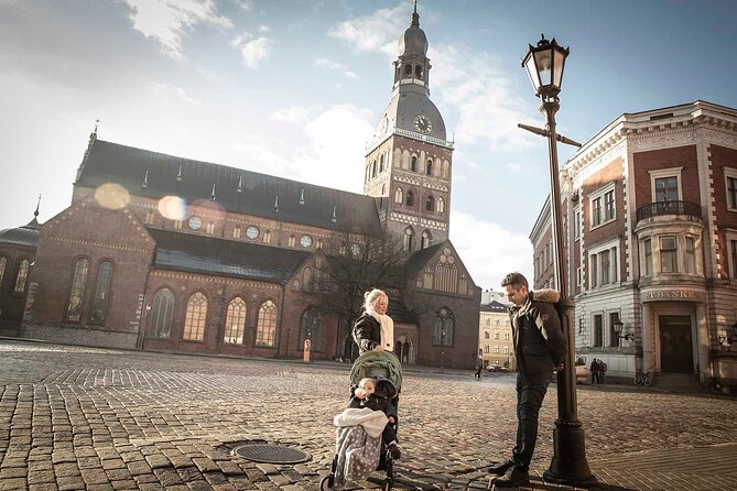 Riga Private Photoshoot Tour - Starting at the Laima Clock and Freedom Monument